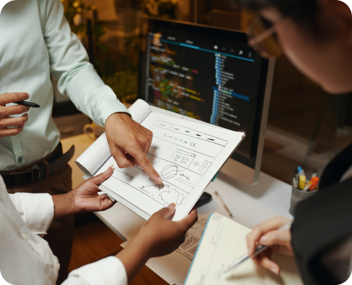 Three people talking about UX design for a webpage